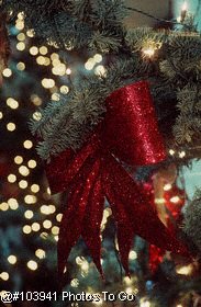 Red ribbon on Christmas tree