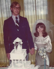 1974keithcarolynwedding--cuttingcake.jpg